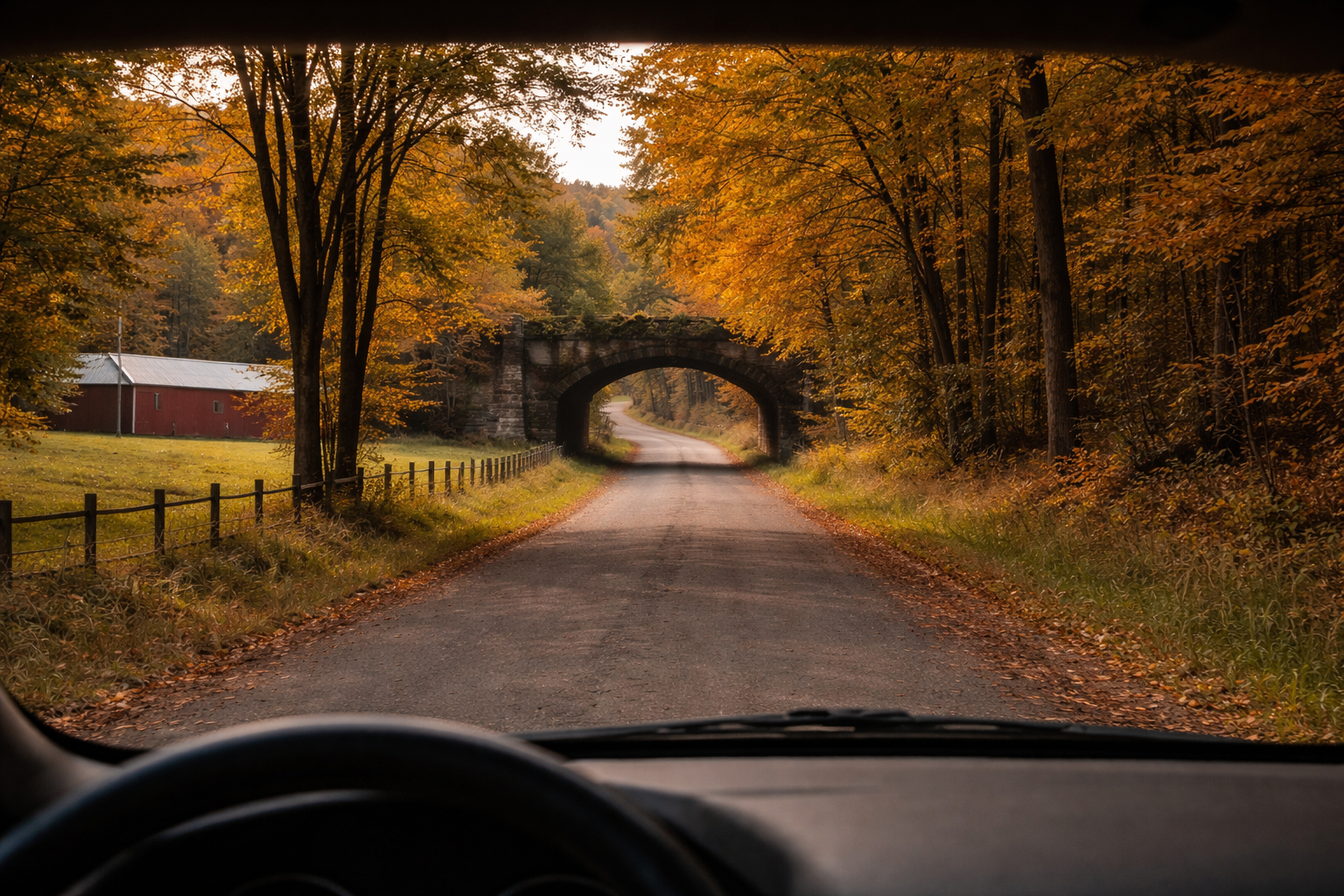 Pennsylvania back road through a windshield in autumn